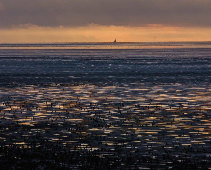Zonsondergang boven de Waddenzee: versie 1